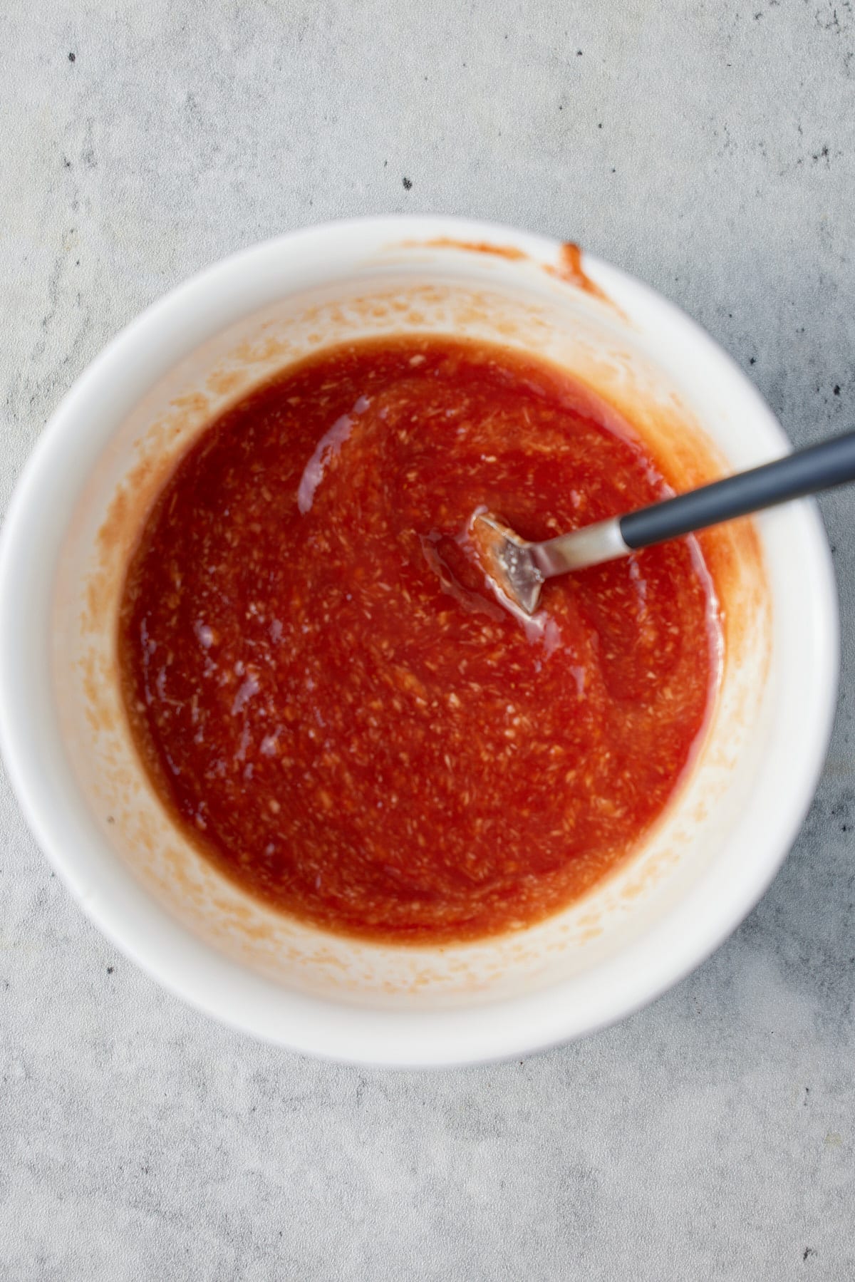 Ingredients in a glass jar before being mixed