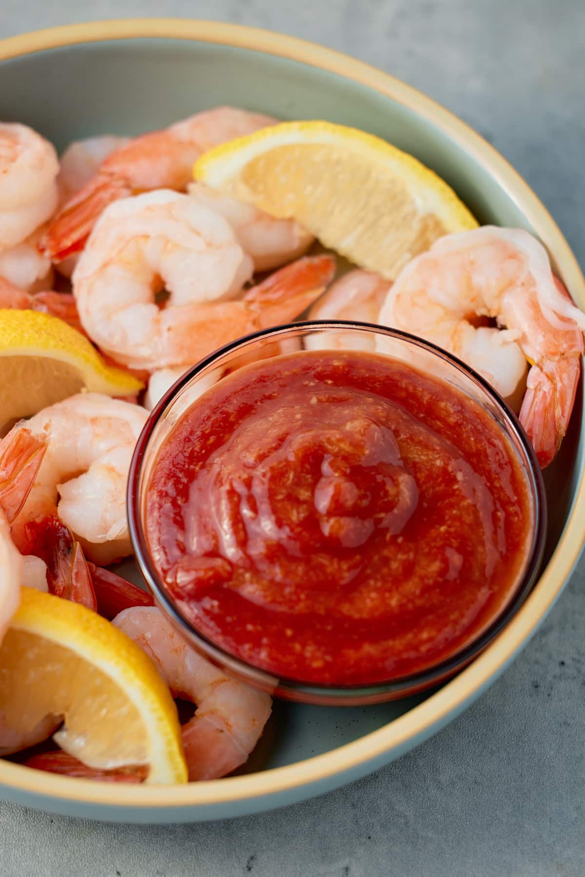 cocktail sauce next to shrimp