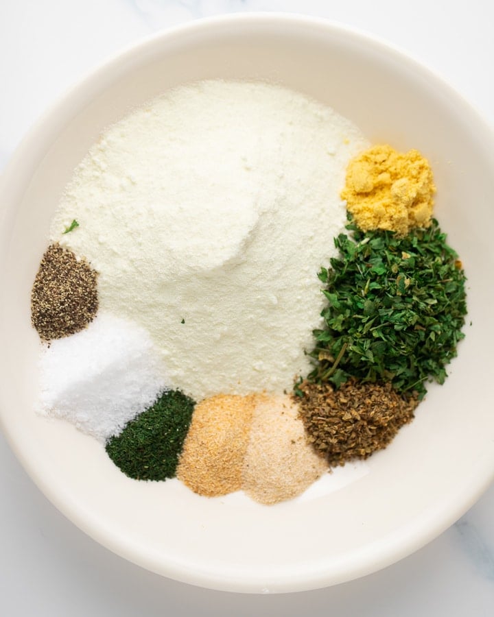 Herbs and spices in a white bowl