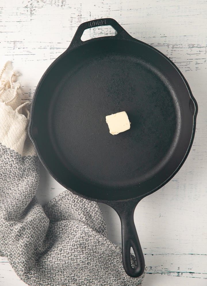 A piece of butter in a skillet