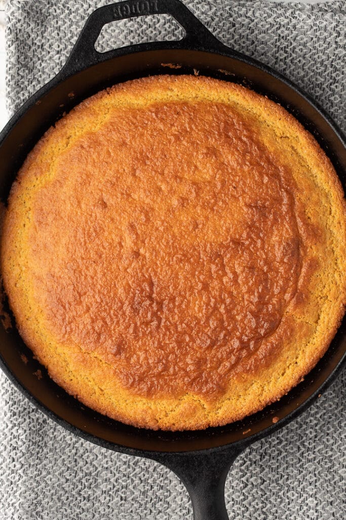 The baked cornbread in a skillet