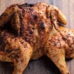 roasted chicken on cutting board