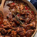 brown stew chicken in pan