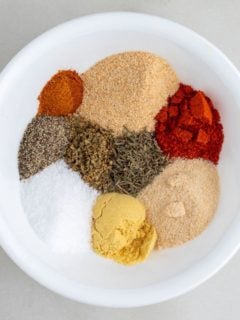 chicken spices in white bowl