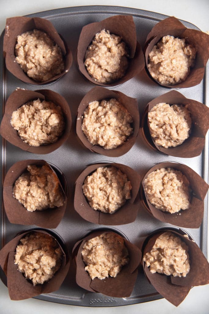 The batter placed into the muffin liners ready to bake.