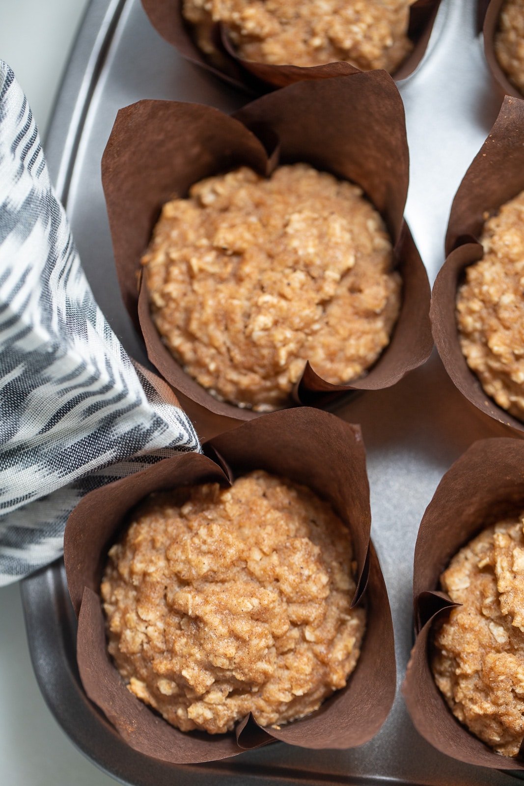 Applesauce muffins in liners ready to eat.