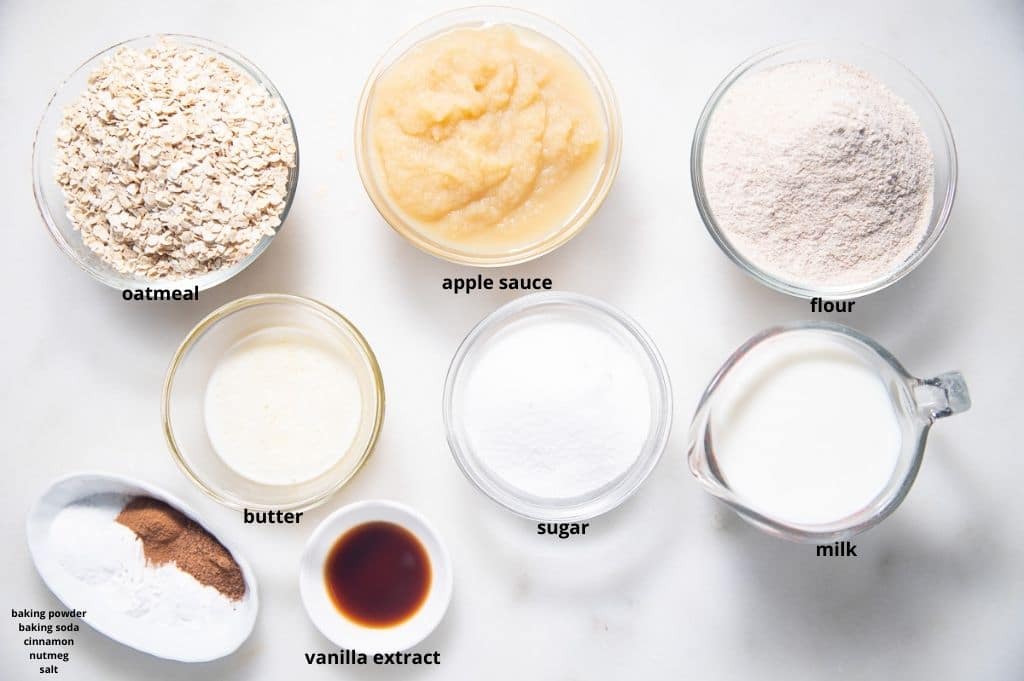 Ingredients to make the muffins in glass bowls.
