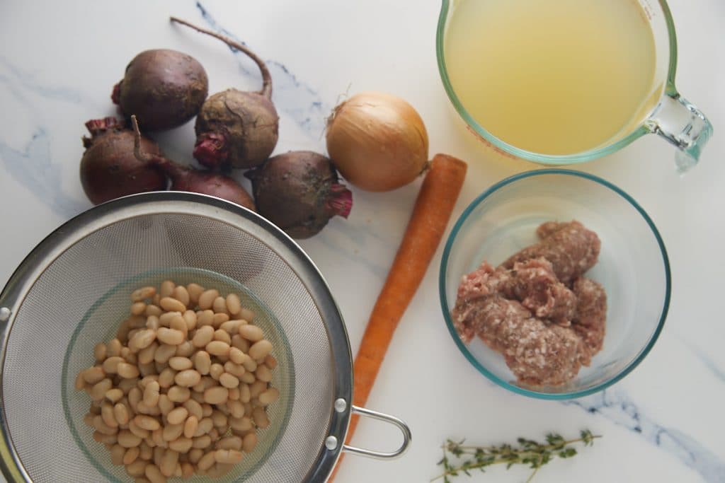 Ingredients for the recipe on a kitchen work top.