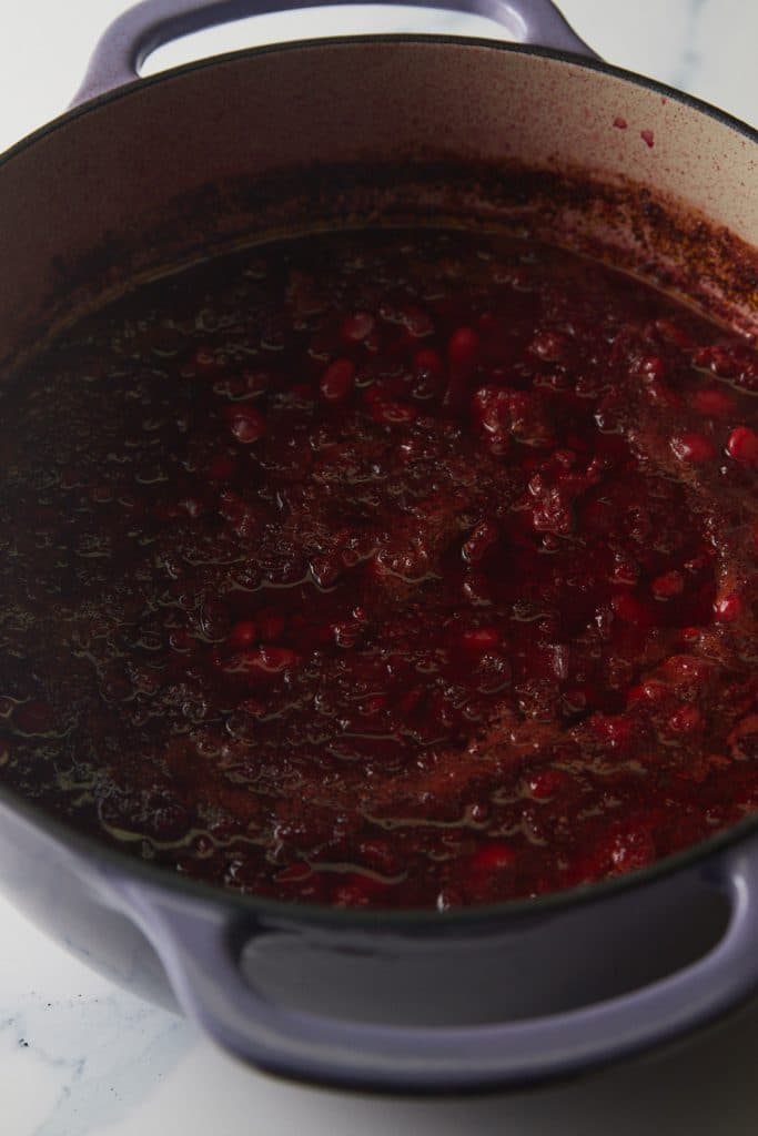 The beet soup in a dutch oven before serving.
