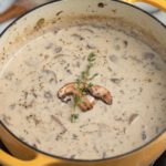 Cream of mushroom soup in a dutch oven.