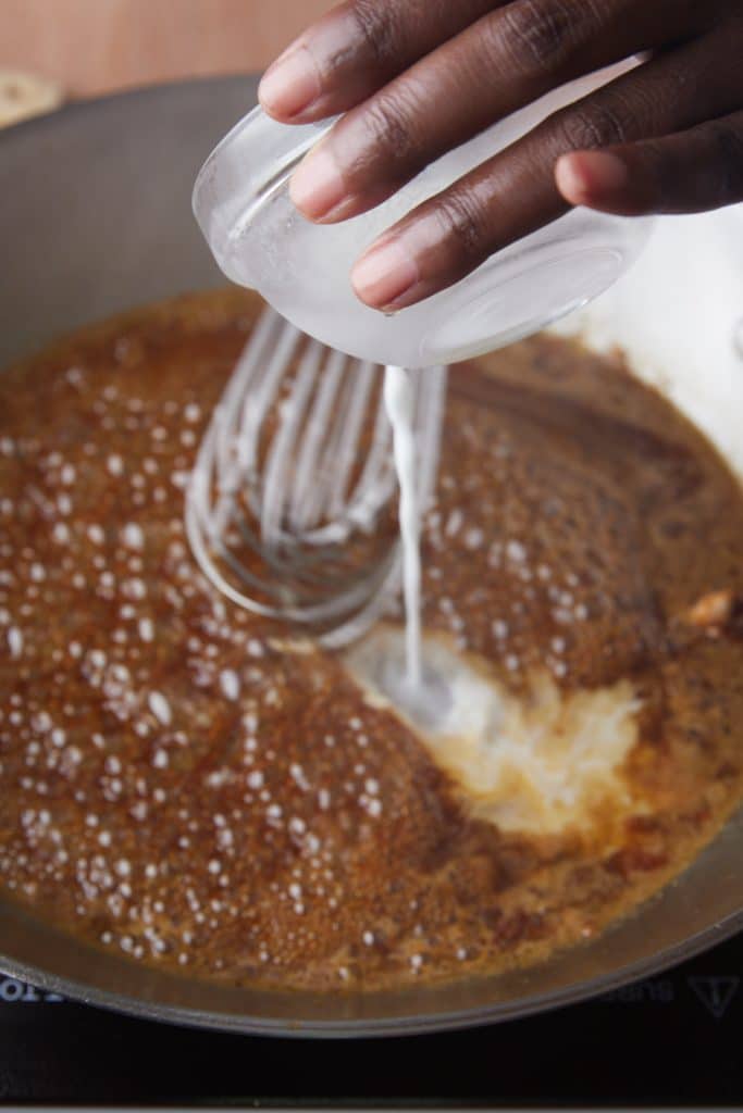 Whisking in the cornstarch mixture.