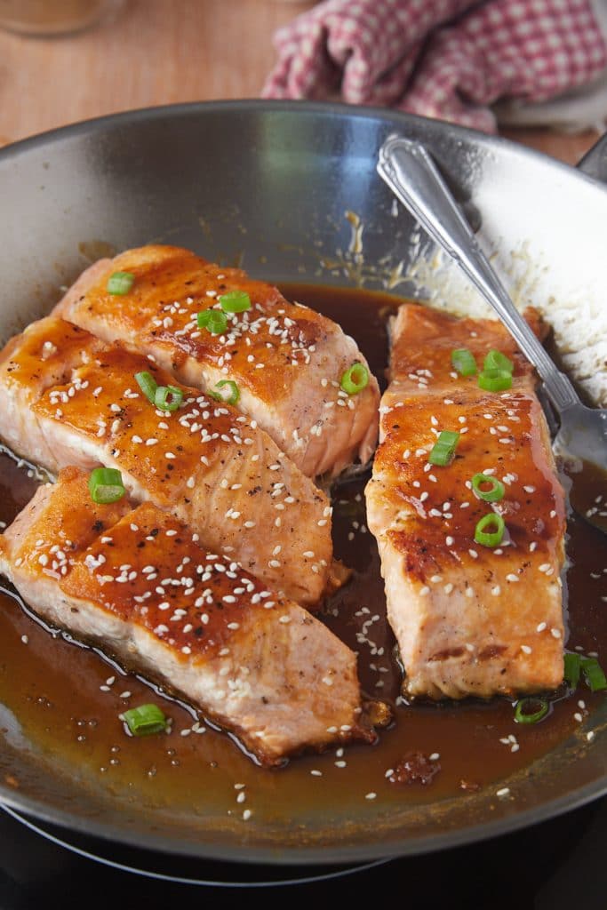 The cooked salmon in a skillet ready to serve.
