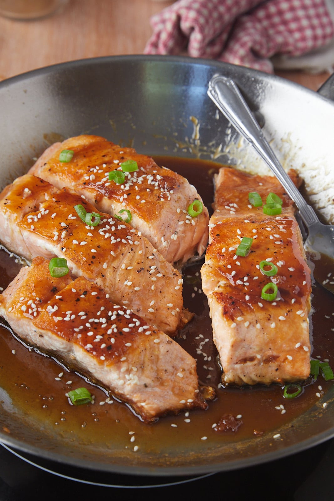 The cooked salmon in a skillet ready to serve.