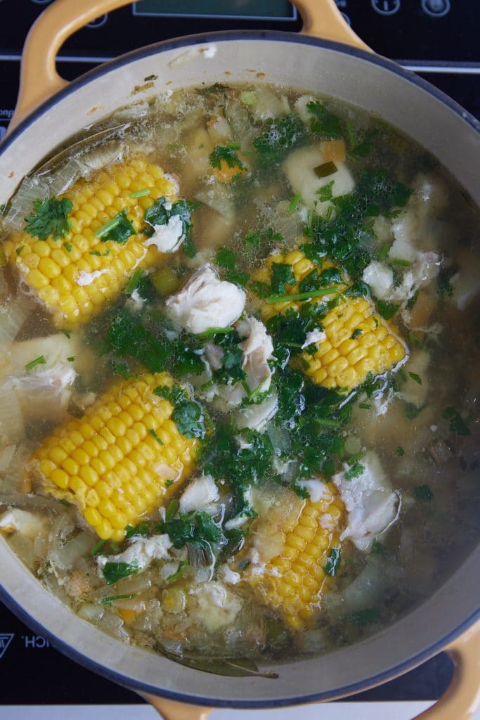 The fish soup in a pot ready to serve.