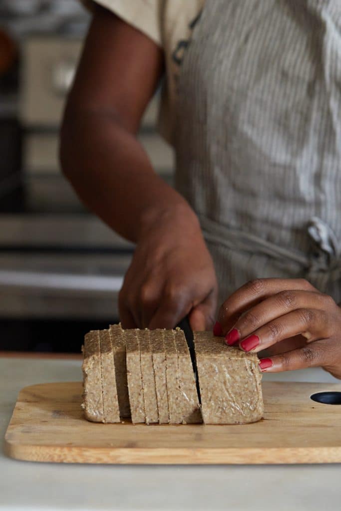 Slicing a block of livermush.