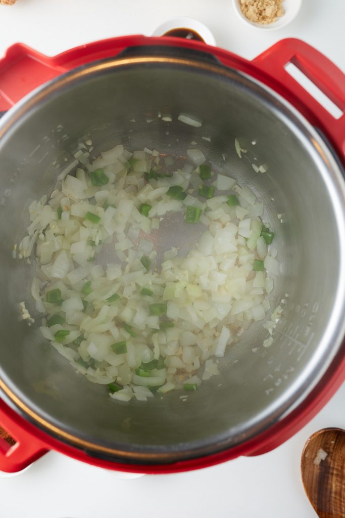 Onions, garlic and jalapeno being cooked in the Instant Pot.