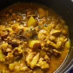 Jamaican chicken curry in a pot.