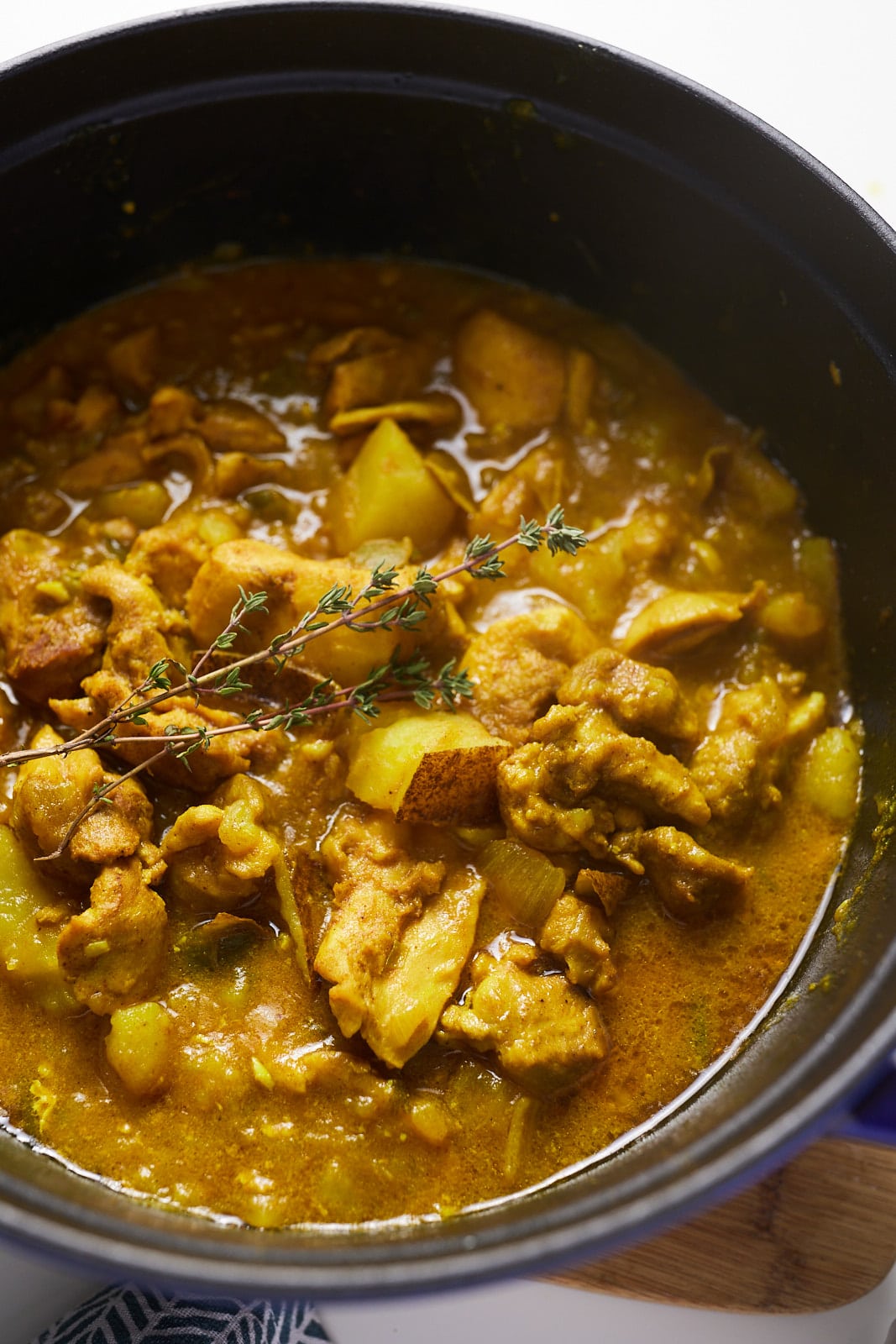 Jamaican chicken curry in a pot.