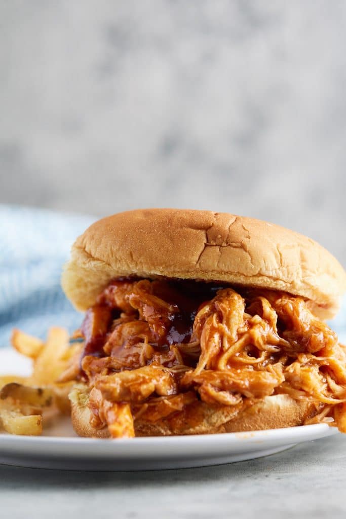 BBQ shredded chicken served in a bun.