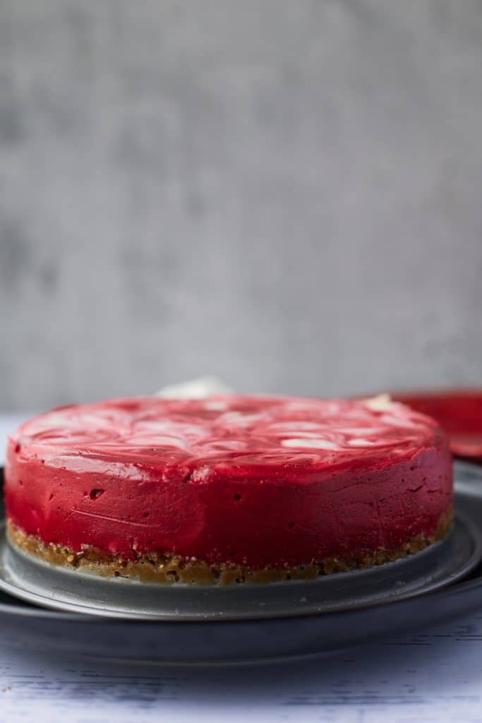 Side view of the red velvet cheesecake.