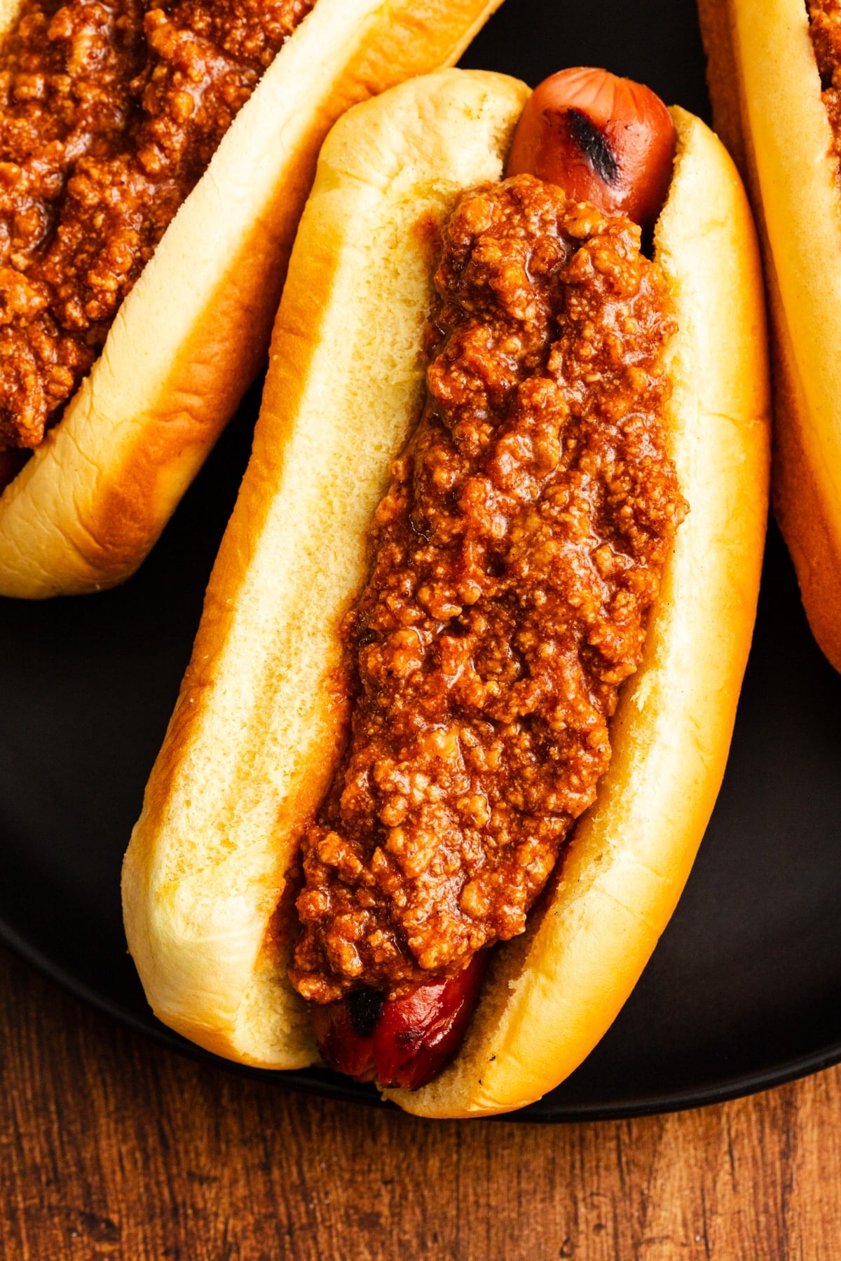 close up of chili on hot dog