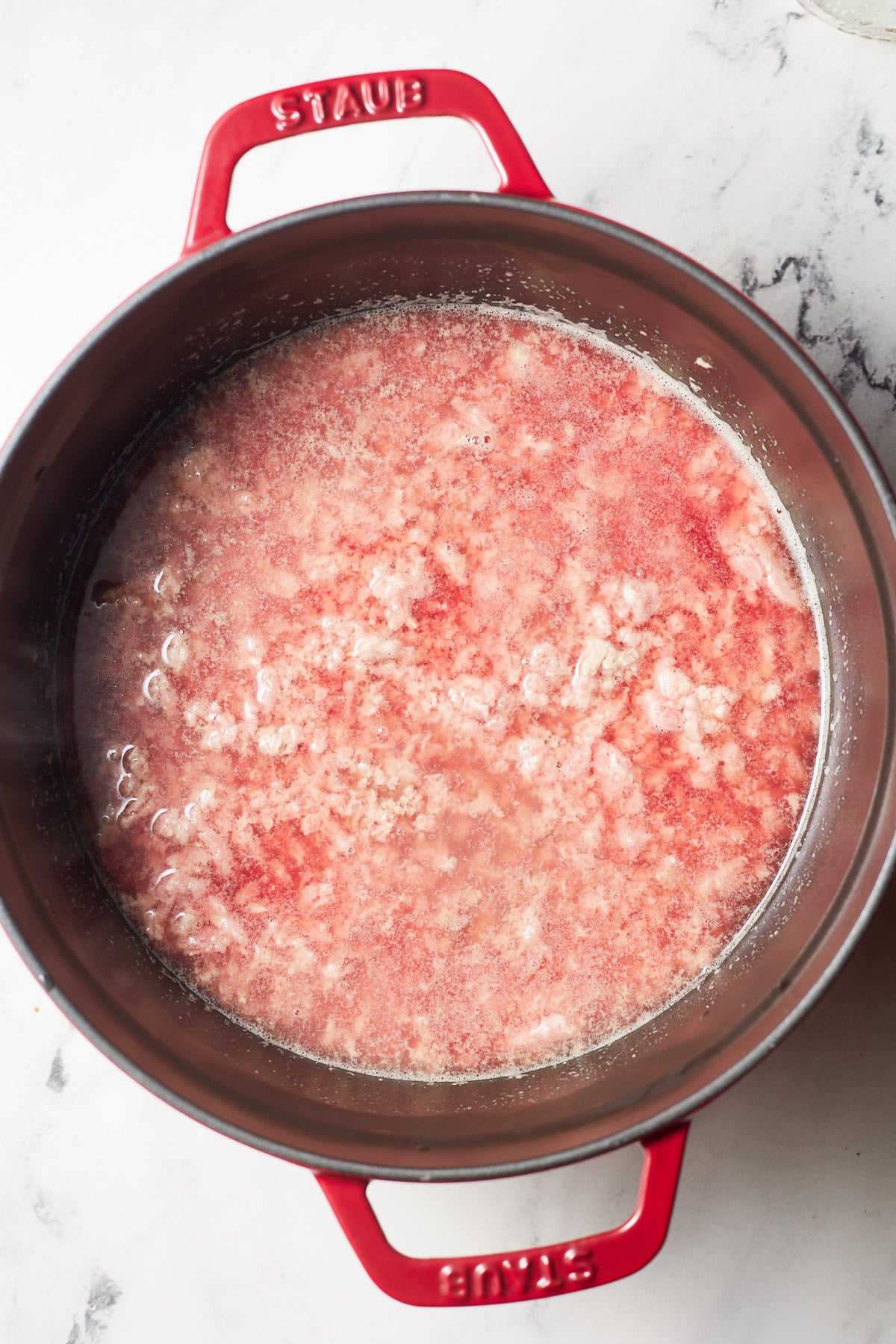 Beef and water in a large pot.