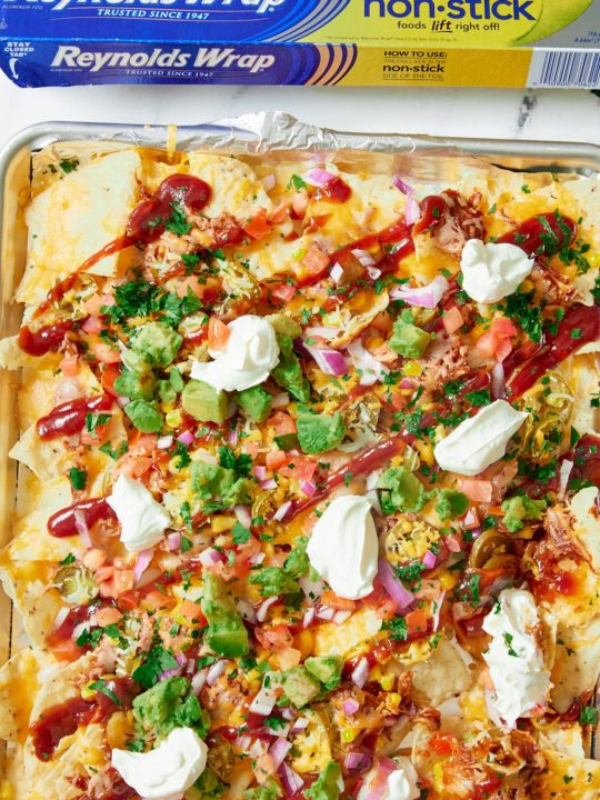 bbq nachos with Reynolds&reg; Wrap Non-Stick Foil box at the top.