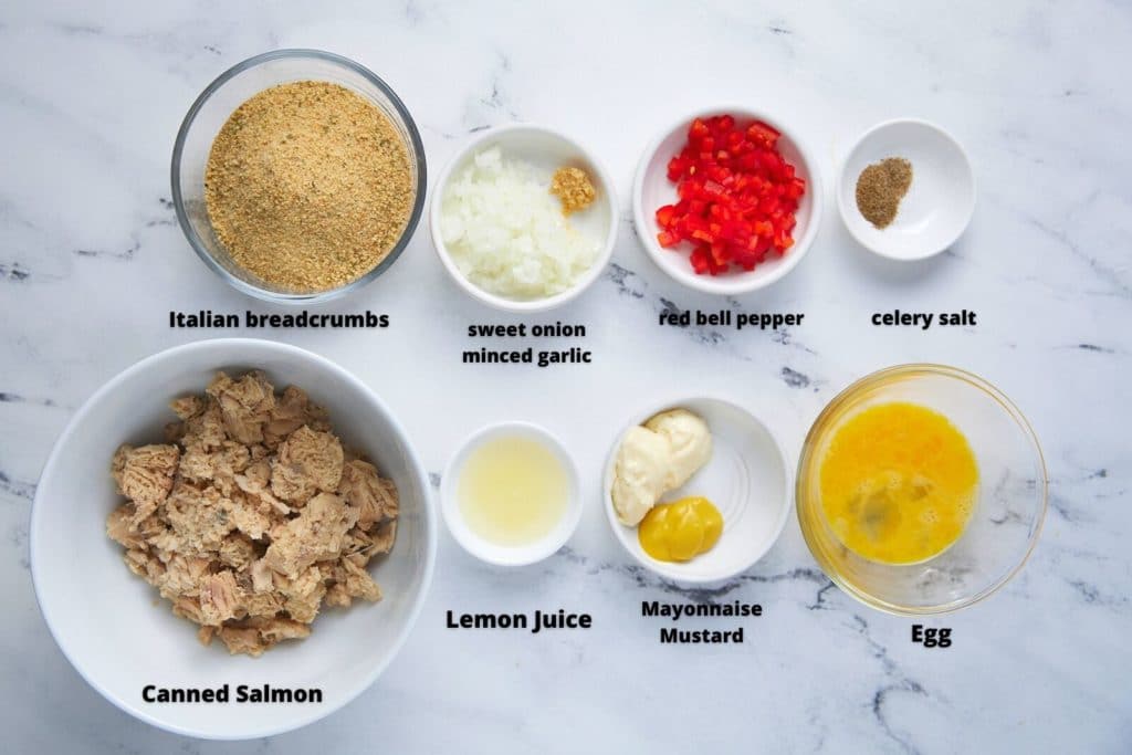 Ingredients to make the salmon patties in glass bowls.