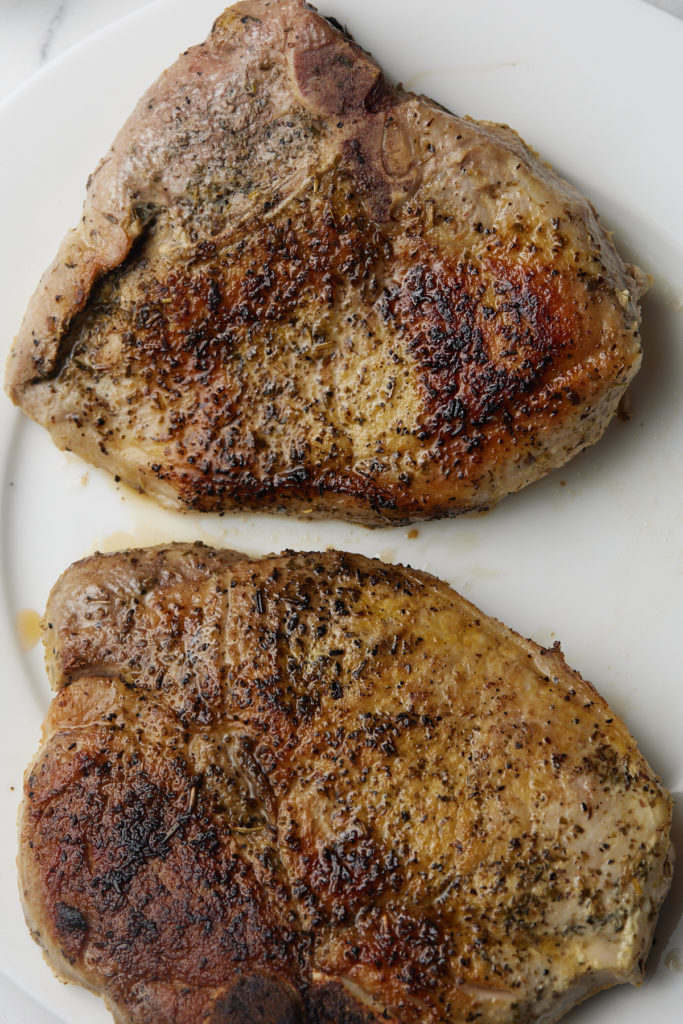 close up photo of browned pork chops