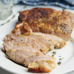 sous vide pork chops sliced on plate