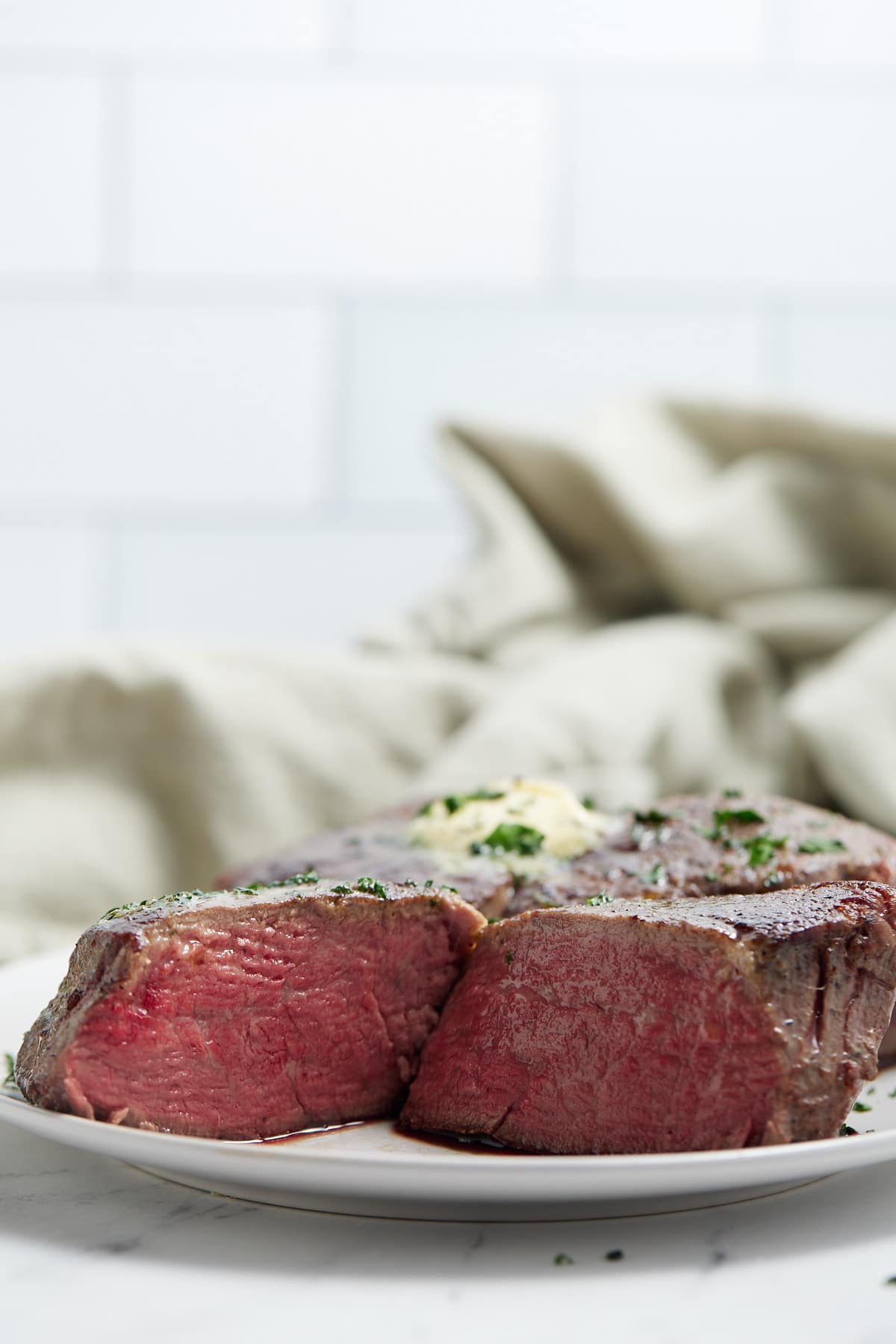 A sous vide filet mignon cut in half.