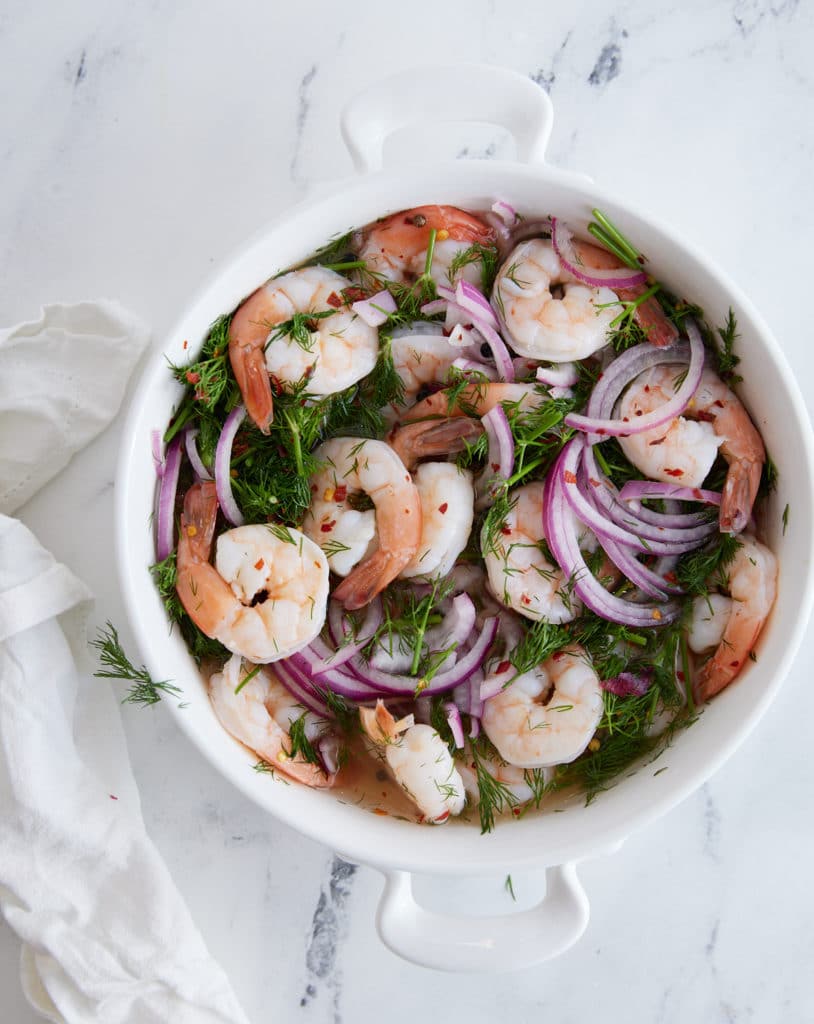 Overhead shot of pickled shrimp in a bowl ready to serve.