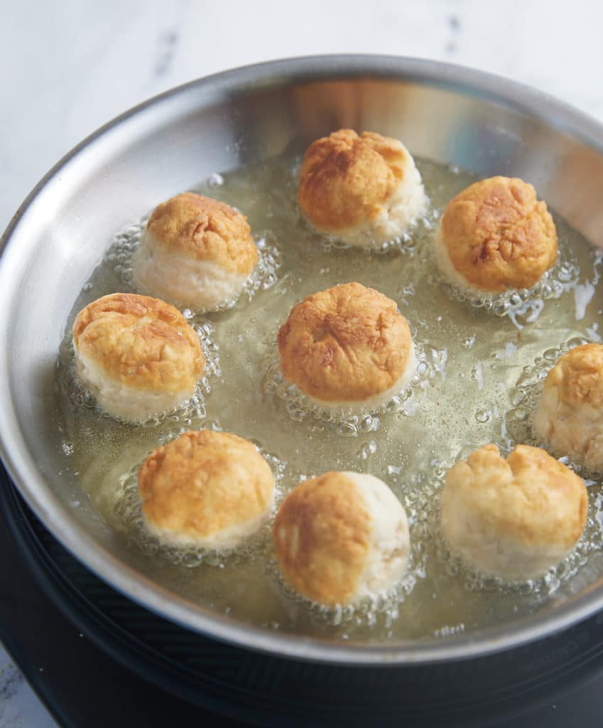 dumplings frying in oil