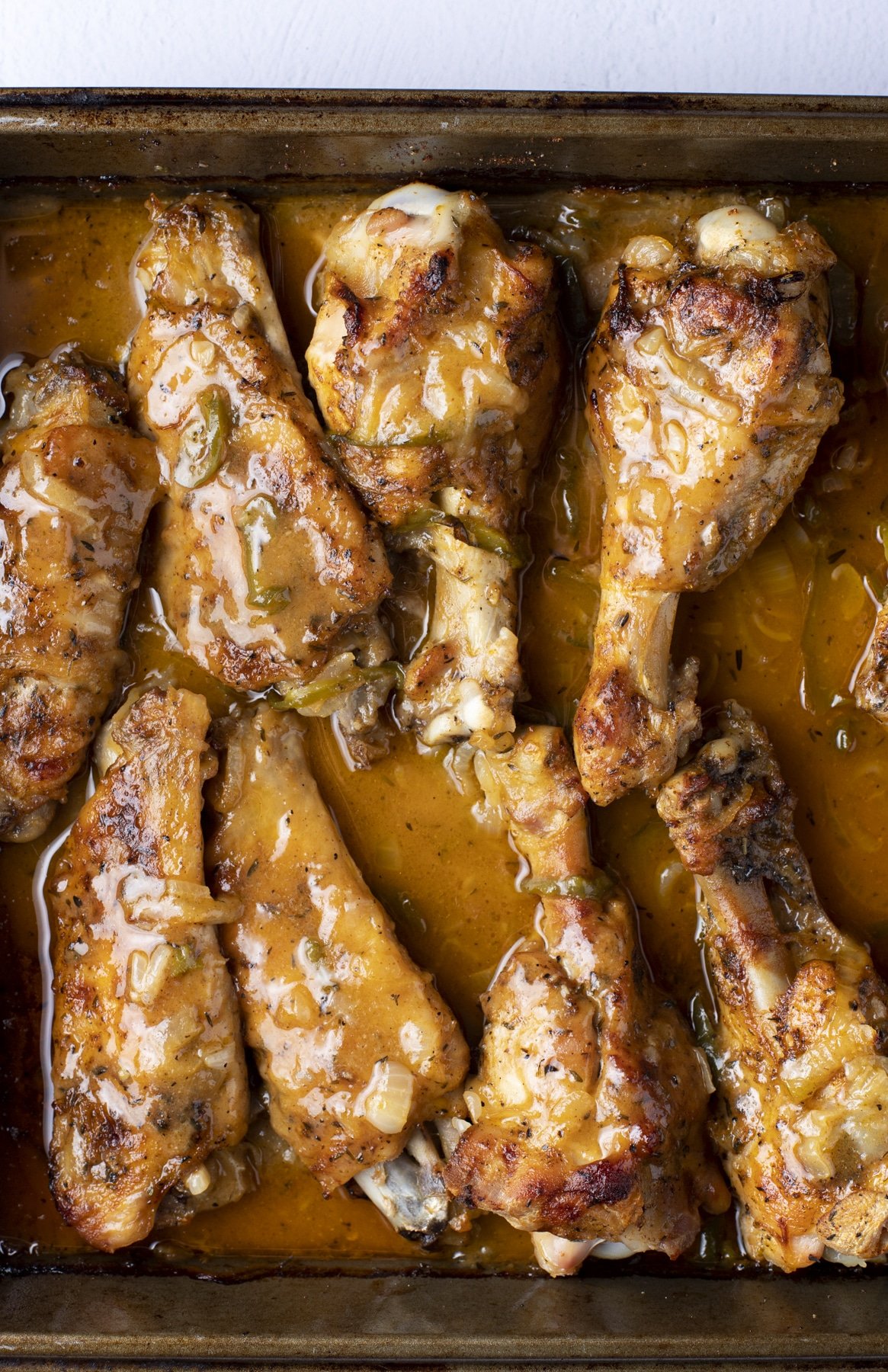 Smothered turkey wings in a roasting tin ready to serve.