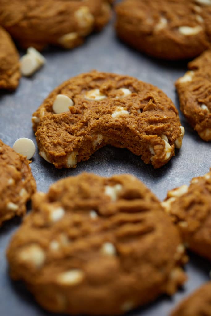 Close up of pumpkin cookies with white chocolate chips.