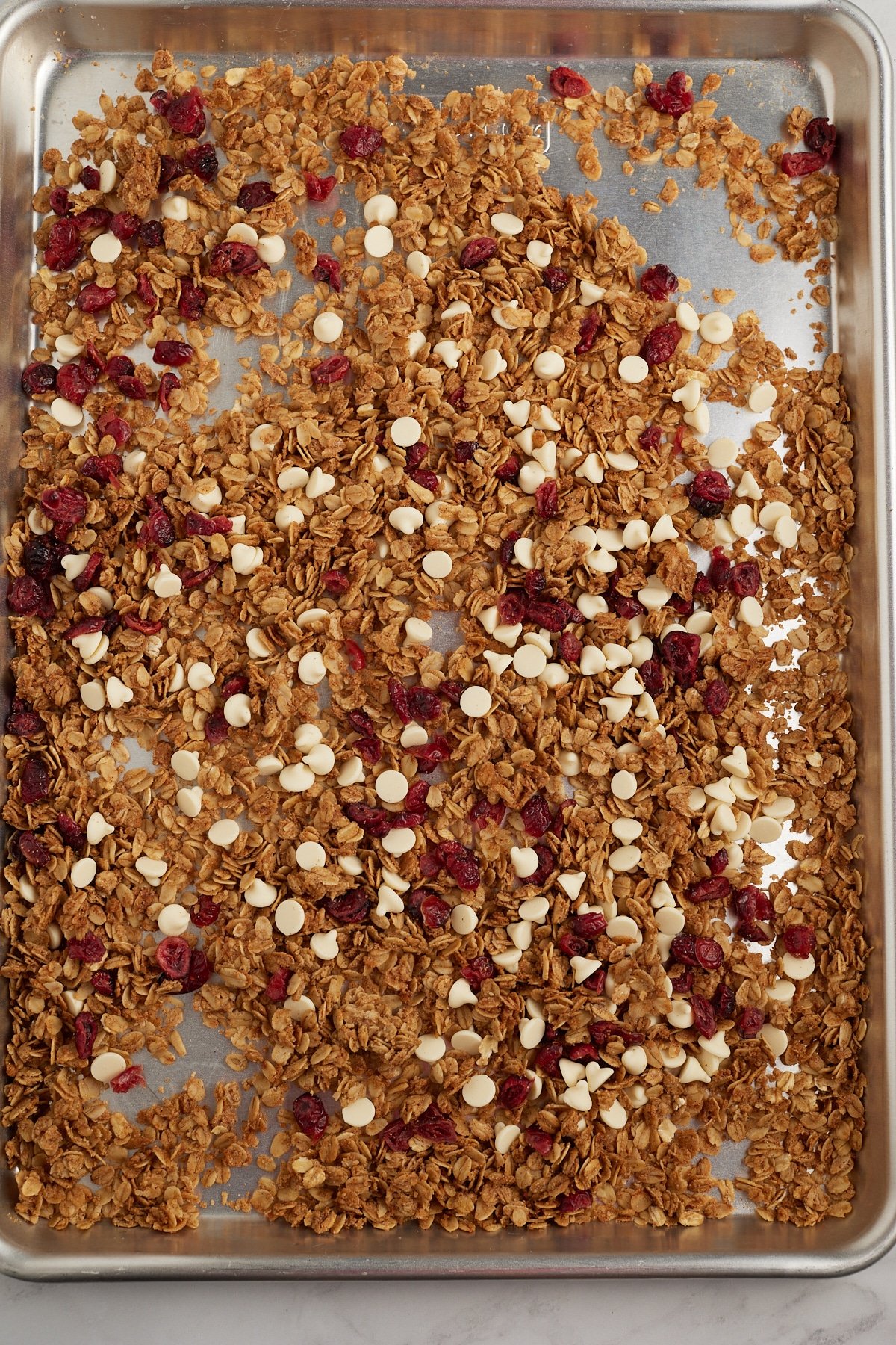 White chocolate and cranberries mixed into the cooked granola.