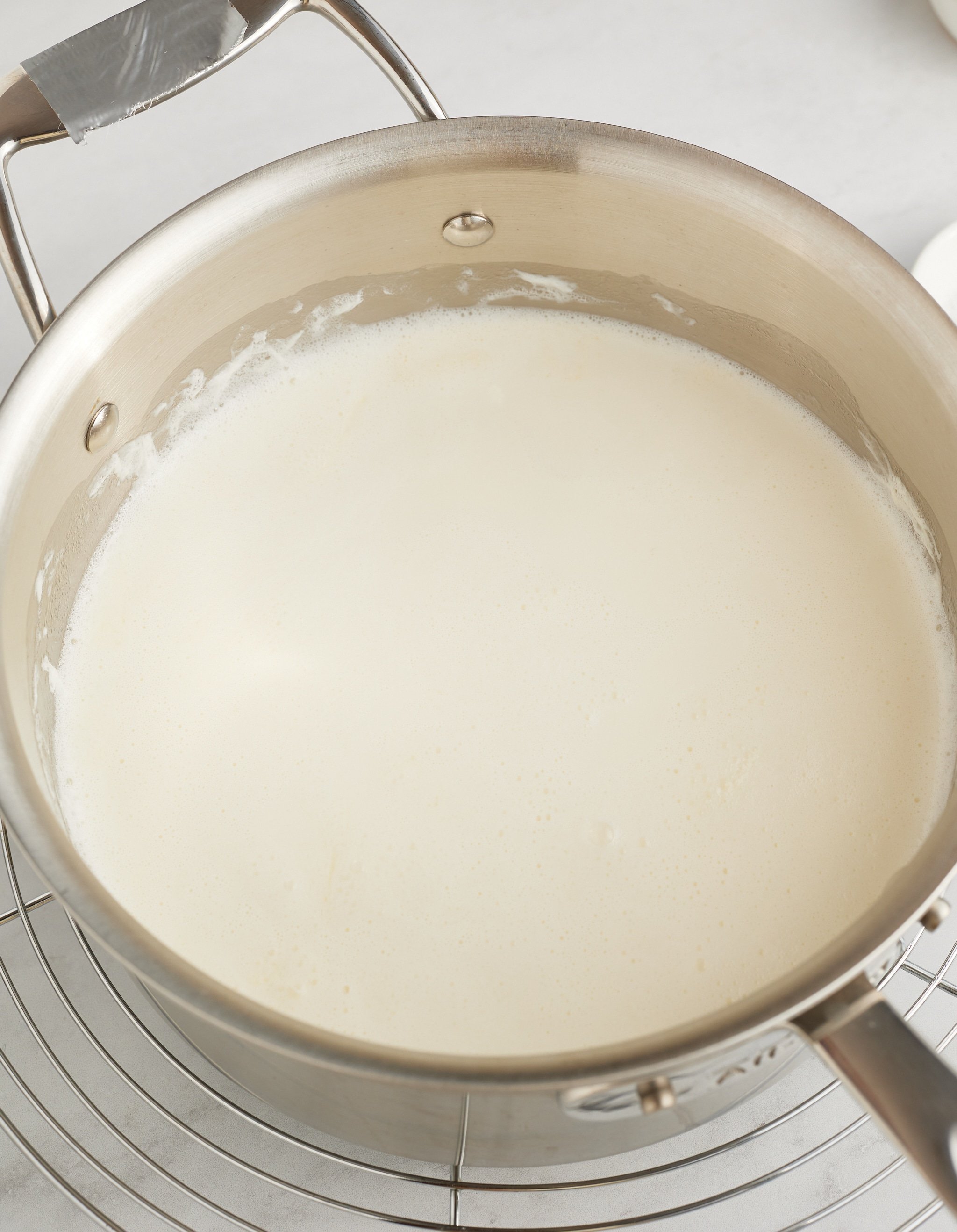 ingredients for grits in saucepan