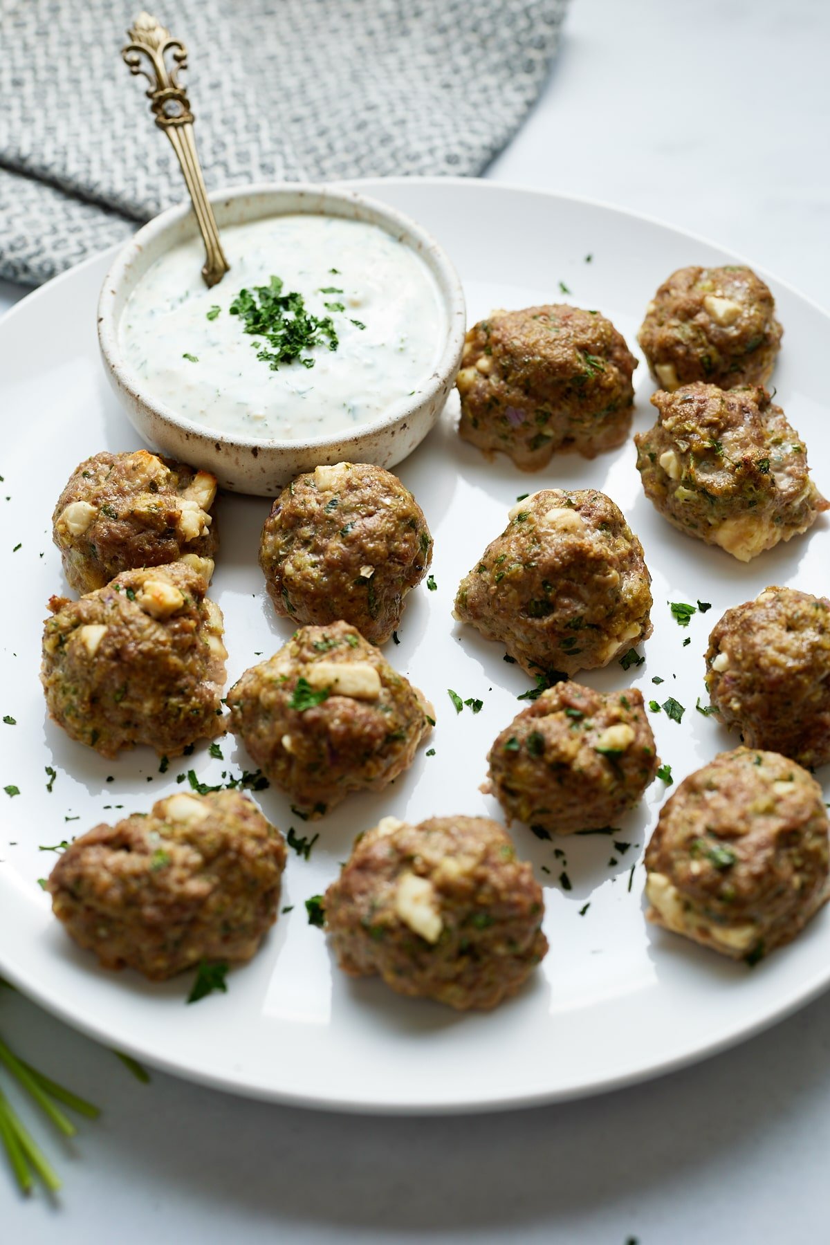 lamb meatballs on white plate