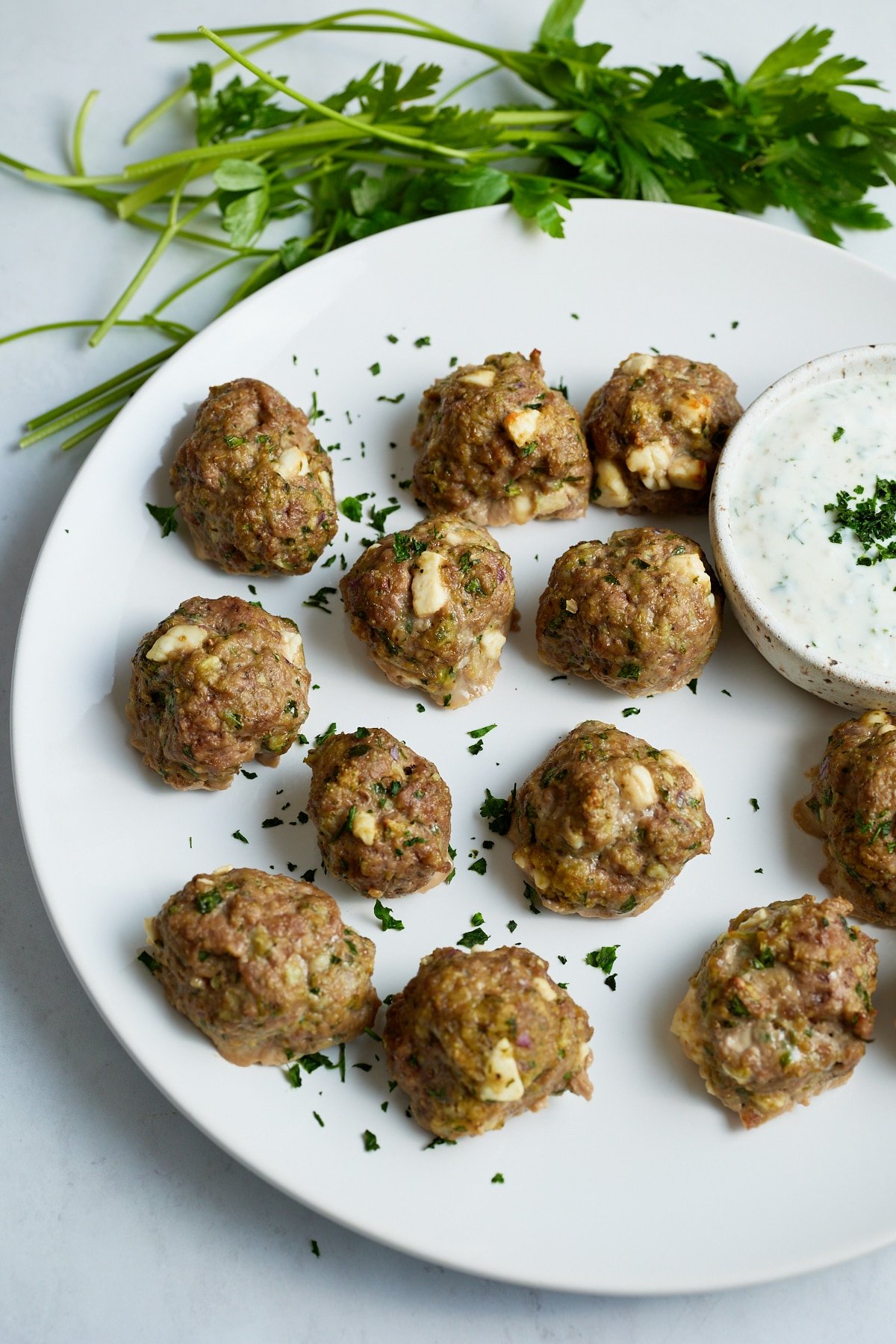 lamb meatballs on white plate