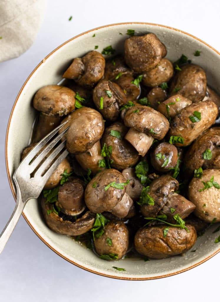 garlic herb mushroom with fork sticking out