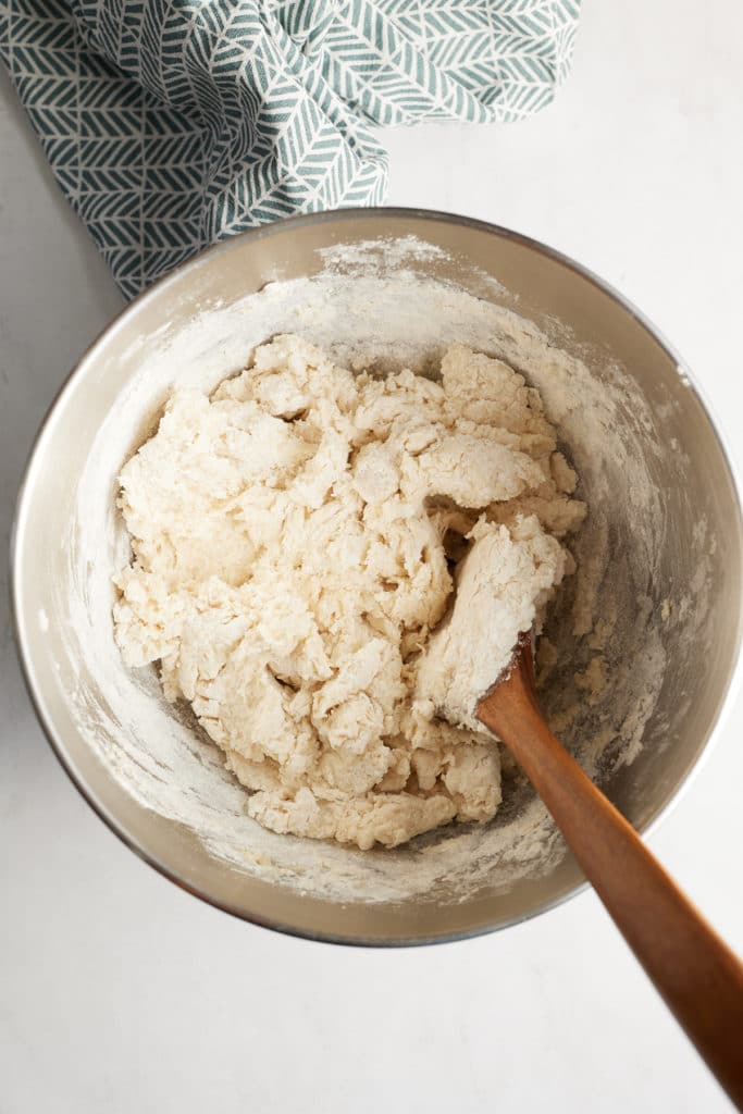 ingredients stirred in mixing bowl with spoon