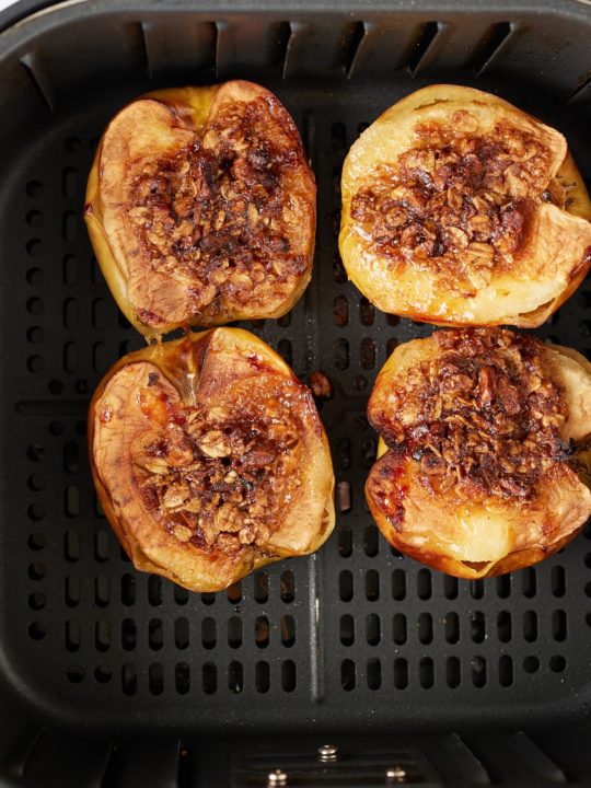 The baked apples in the air fryer basket.