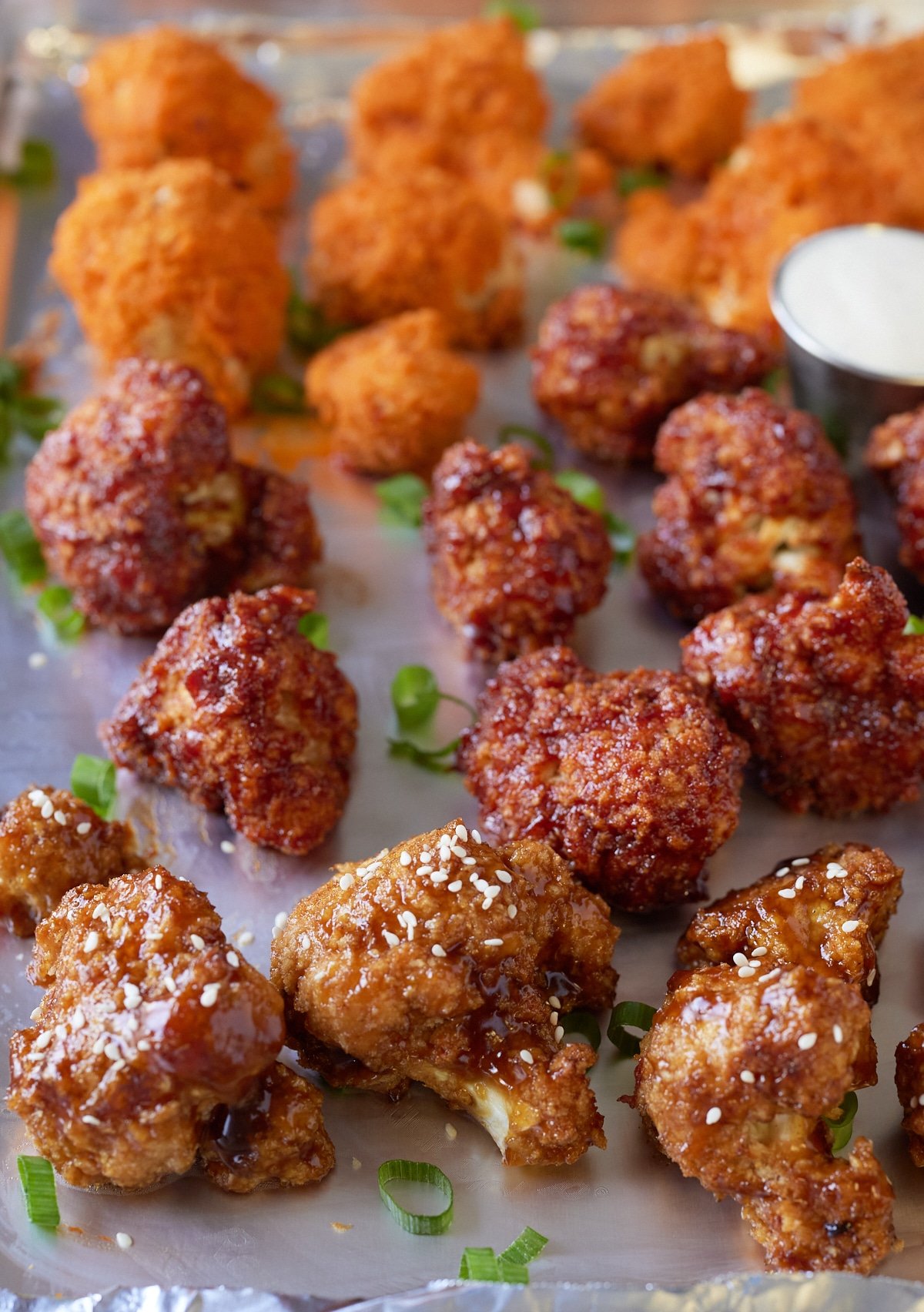 cauliflower wings on baking sheet lined with foil