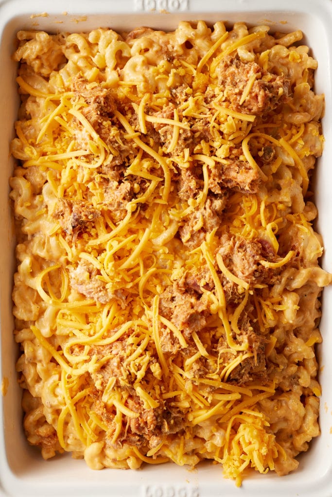 The mac and cheese topped with more cheese and BBQ pork.