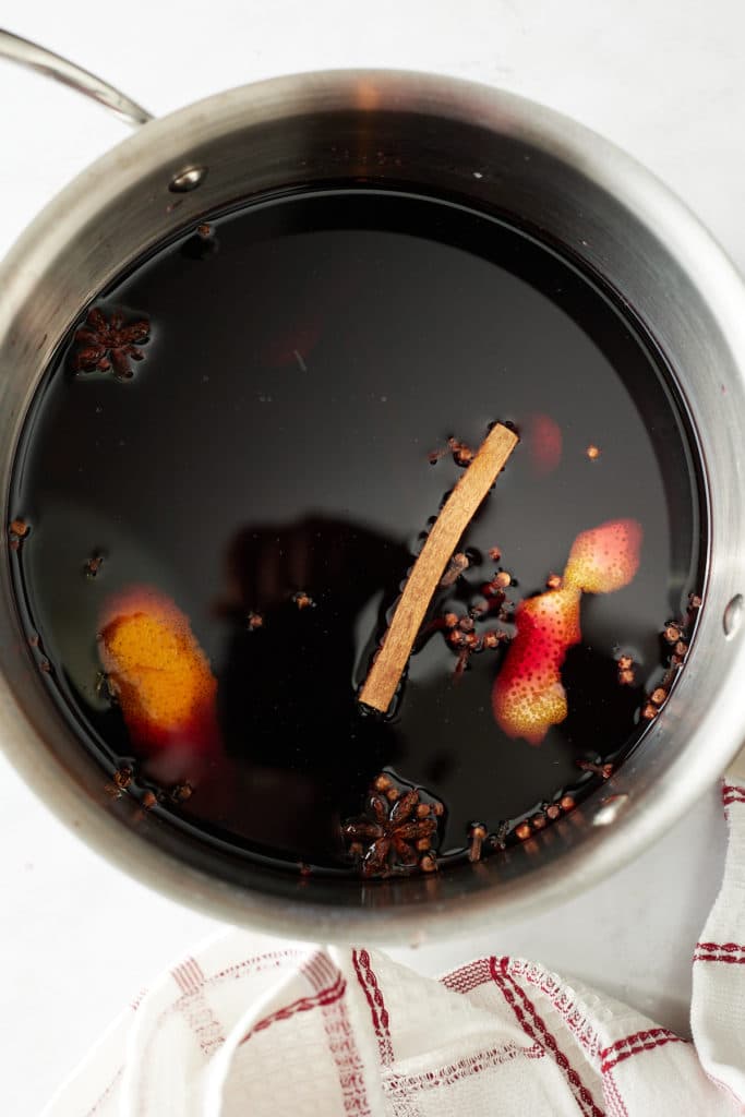 Red wine and spices in a pot.