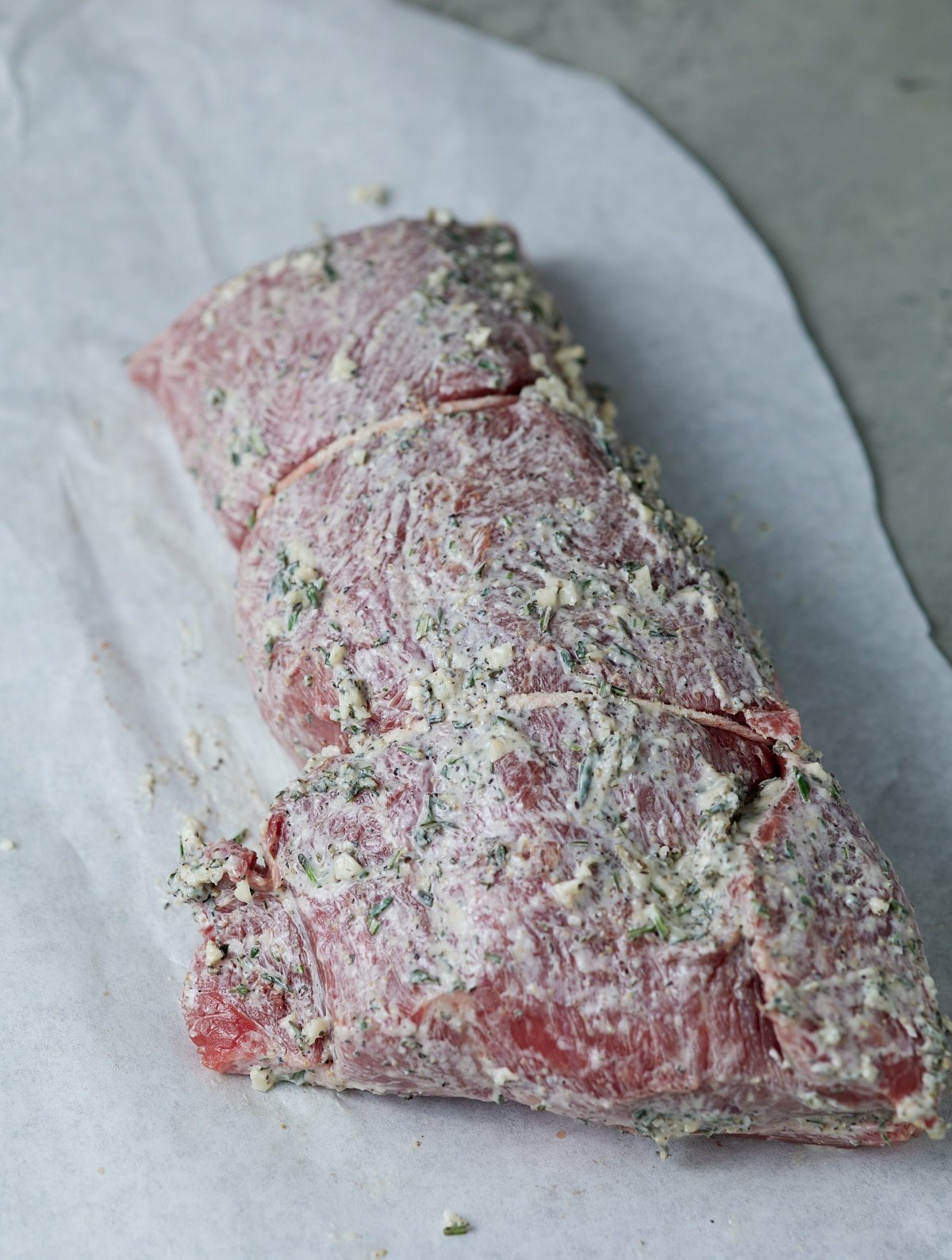 Beef tenderloin rubbed with the mayonnaise and herb mixture.
