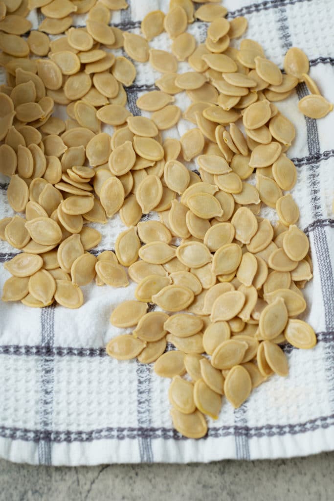 pumpkin seeds on kitchen towel