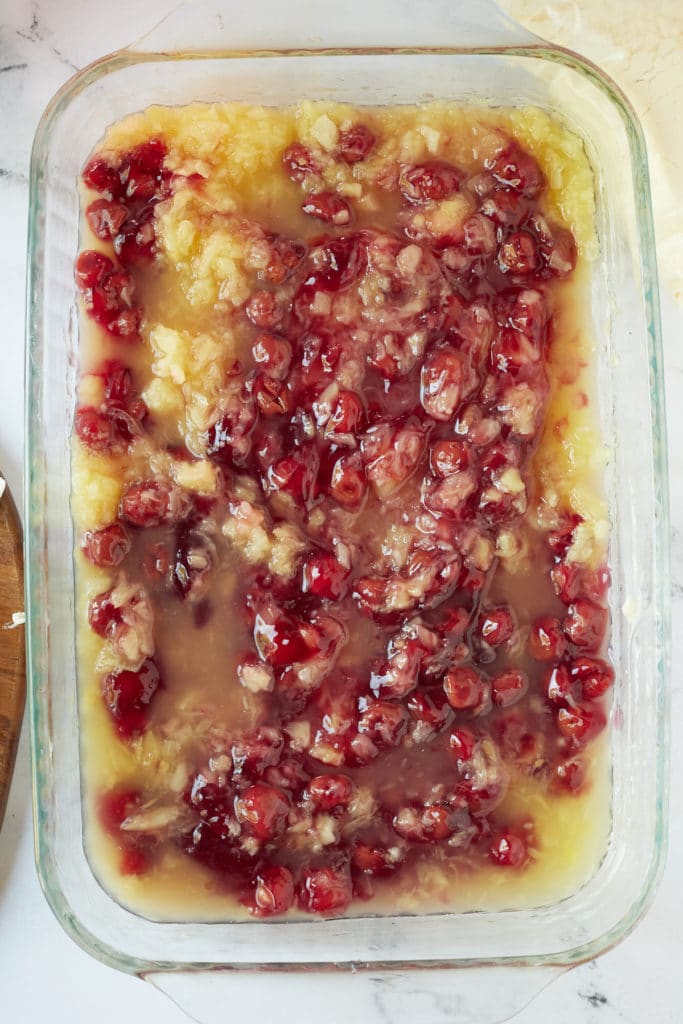 Cherry pie filling added to teh baking dish.