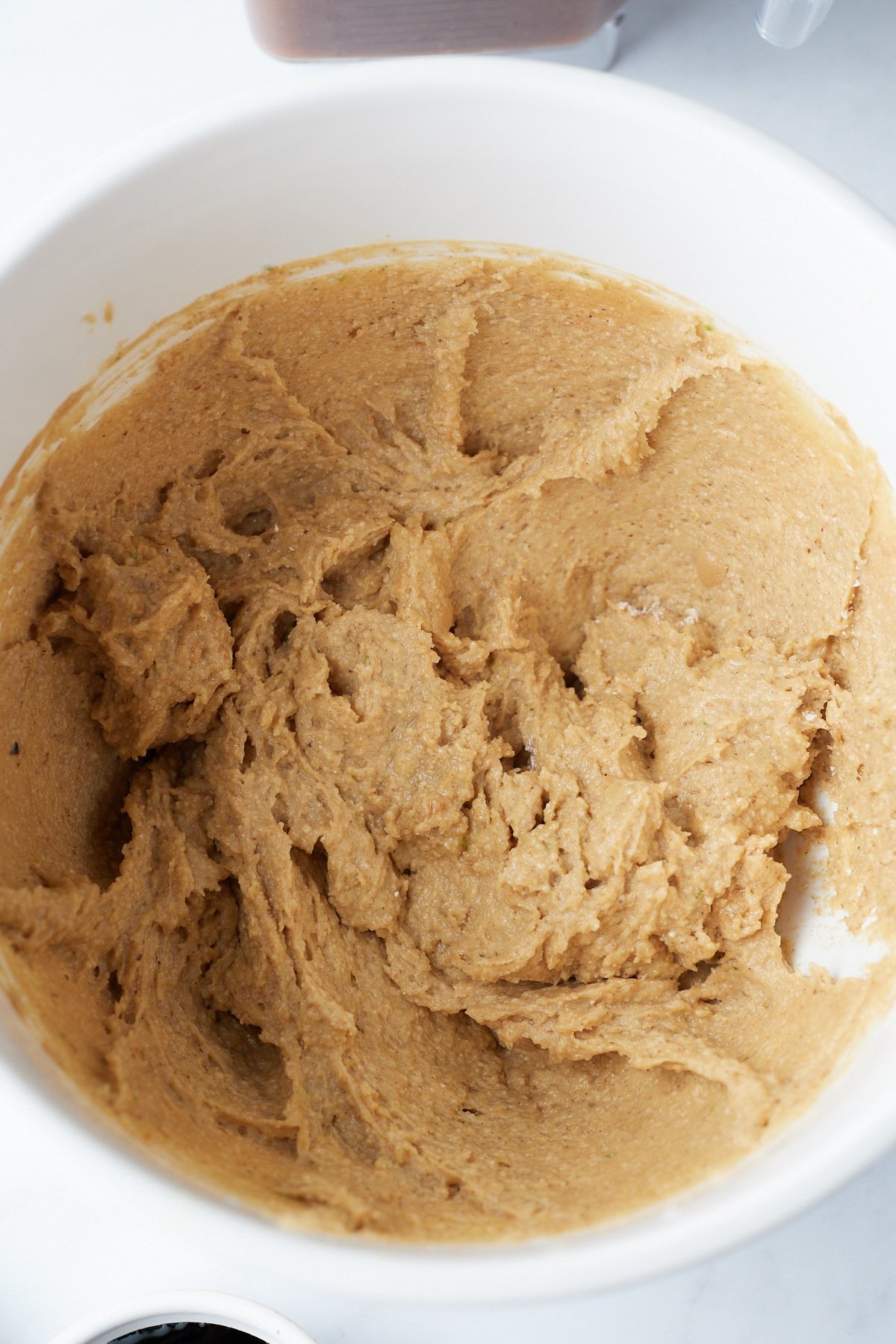 butter and suger that has been beaten in bowl