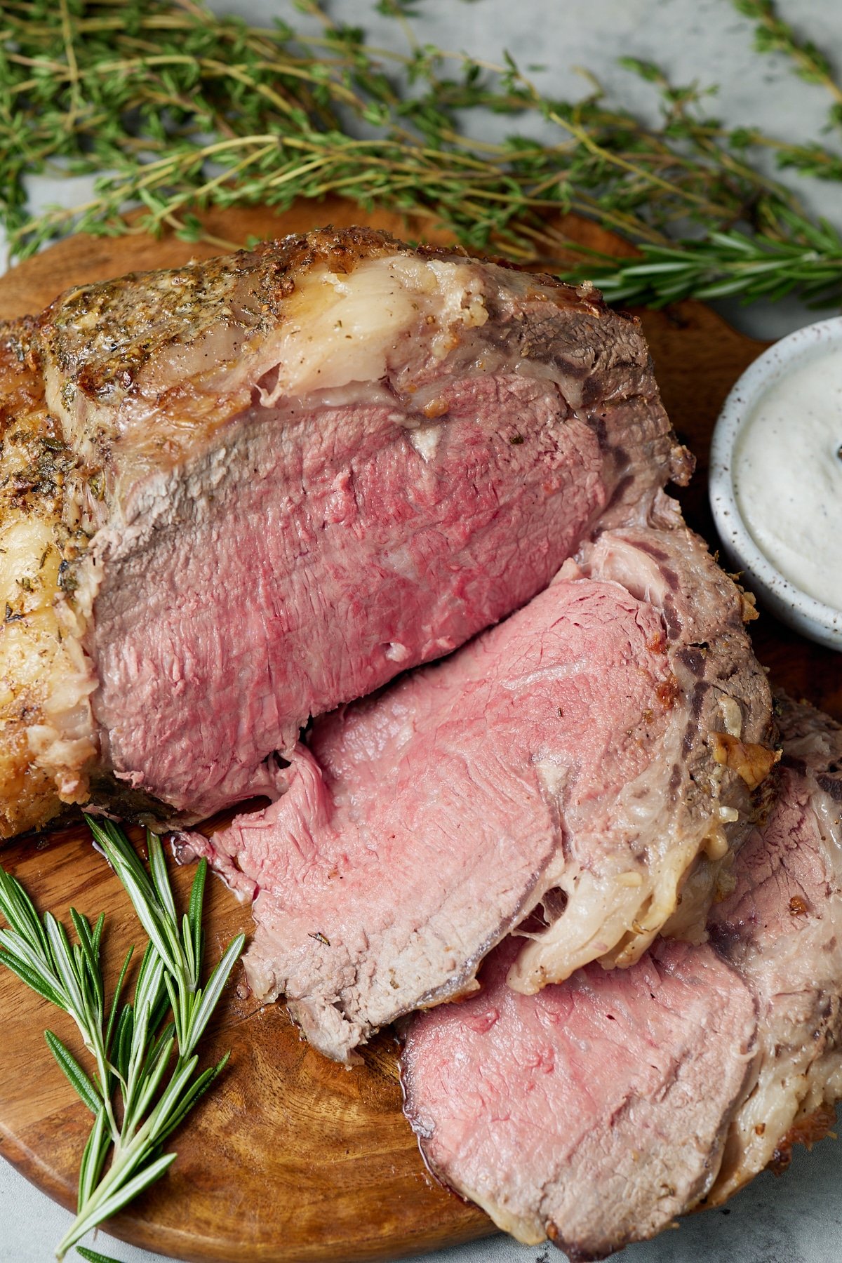 The cooked boneless roast beef carved into slices.